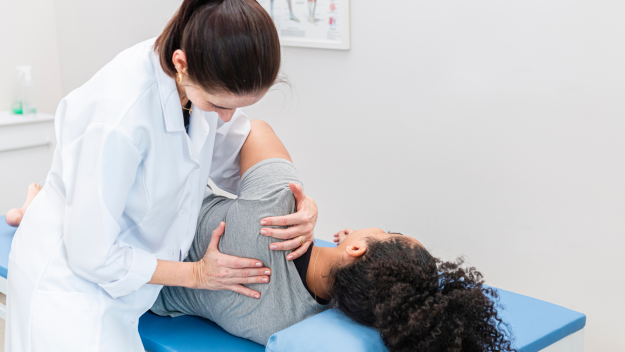 Woman Receiving Physio After Childbirth